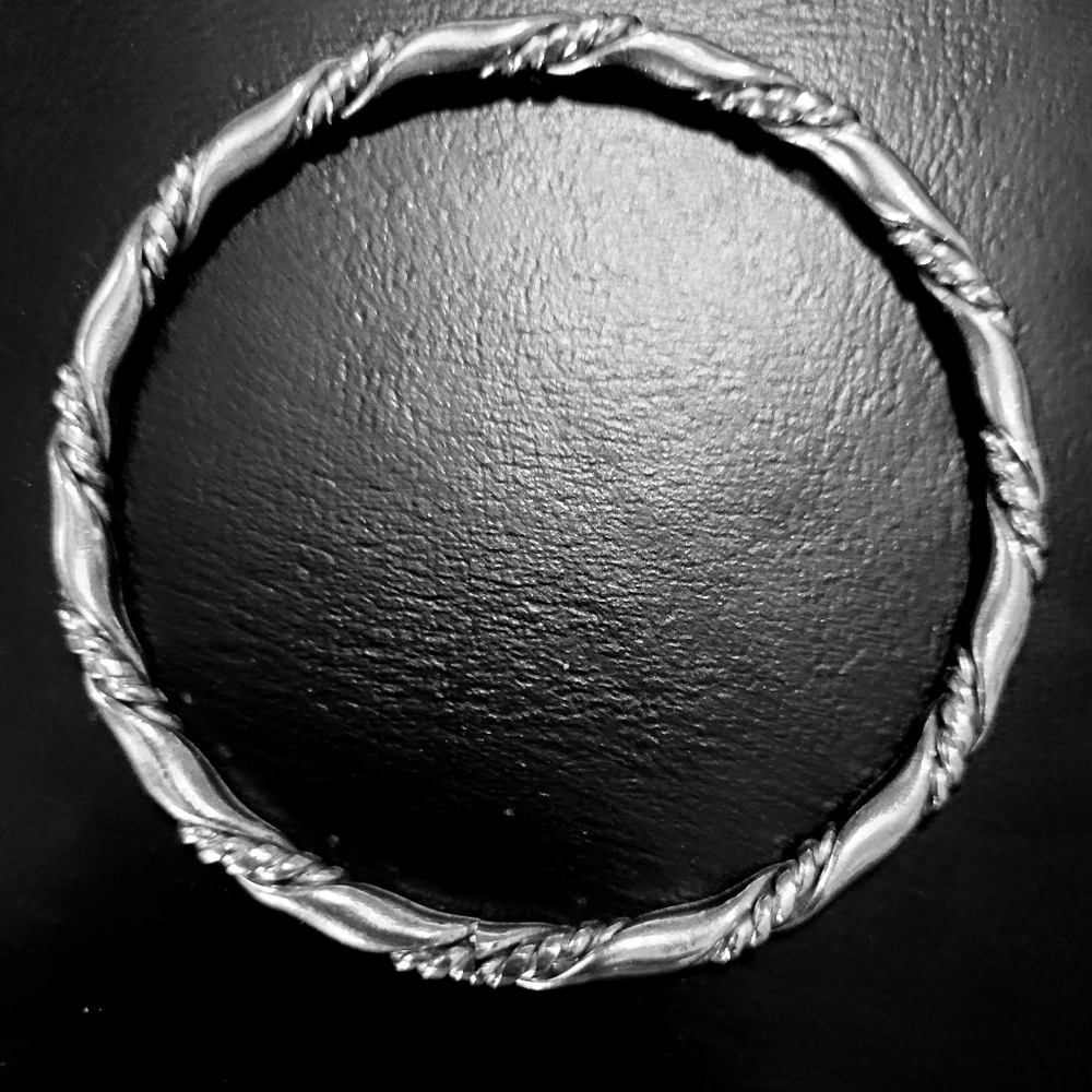 Elegant Silver Twisted Bangle